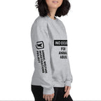 Person wearing a gray sweatshirt with text and logo on a white background